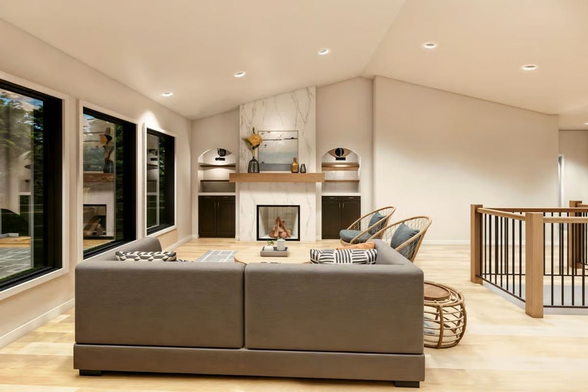 Vaulted Ceiling, Marble Surround, Rattan Chairs — Upper-Level Living Done Right