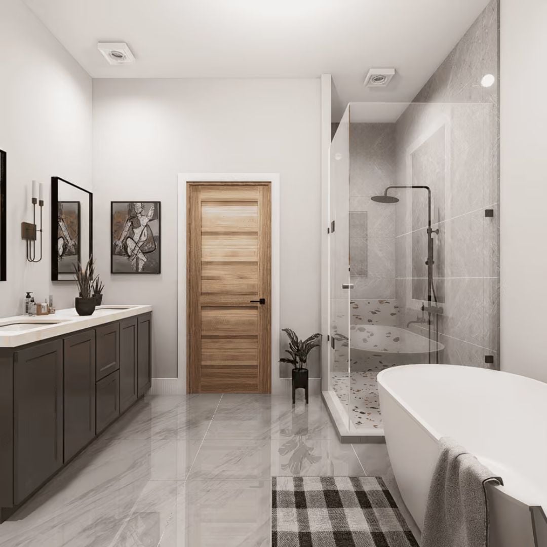 Frameless Glass, Freestanding Tub, and a Vanity That Earns Its Square Footage