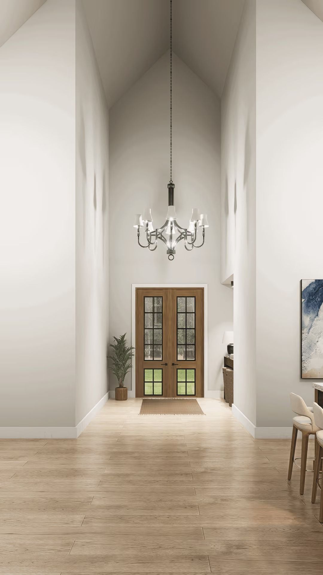 Vaulted Foyer Entry with French Doors and a Chandelier Worth the Ceiling