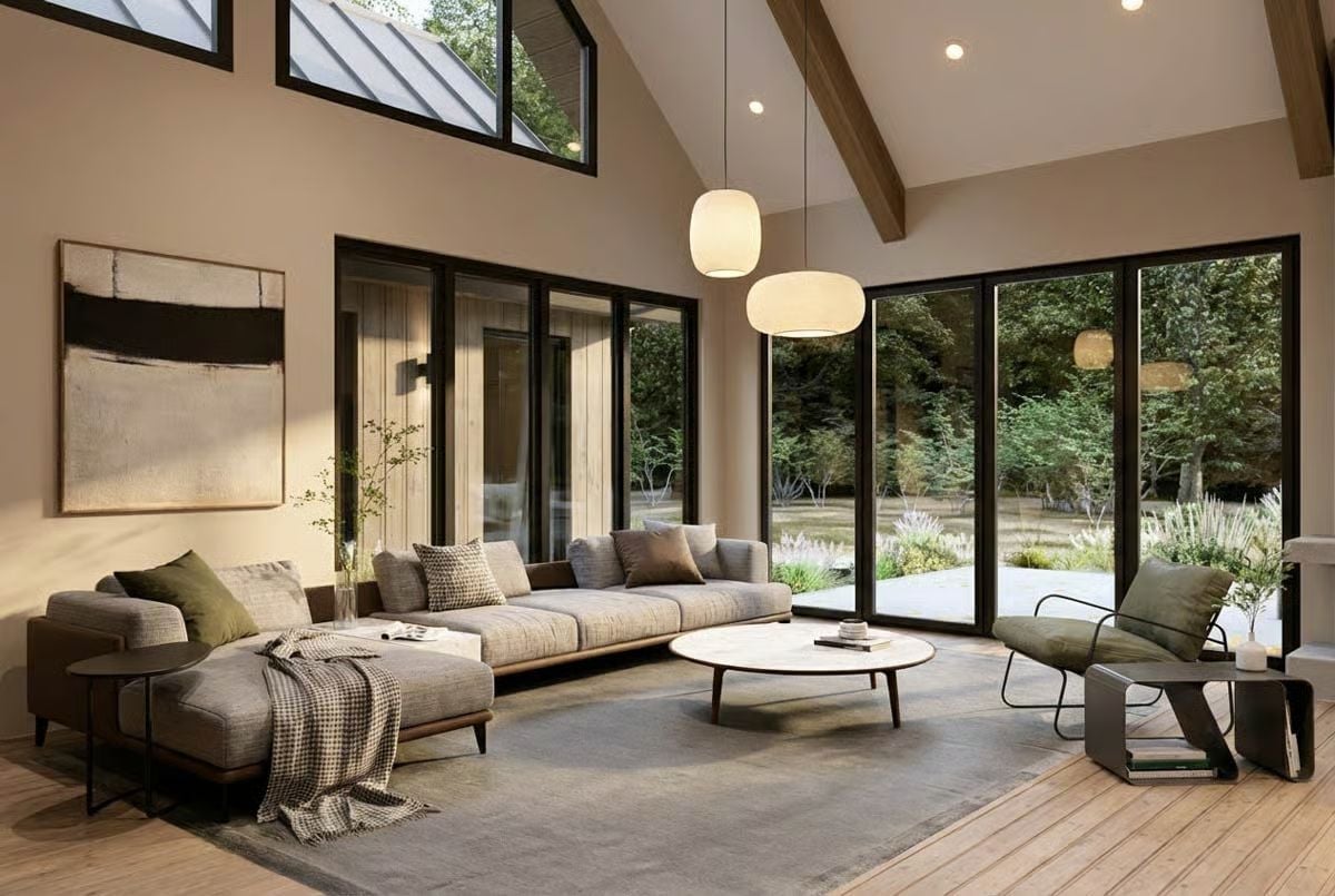 Pendants Over a Sectional, Forest Just Beyond the Glass