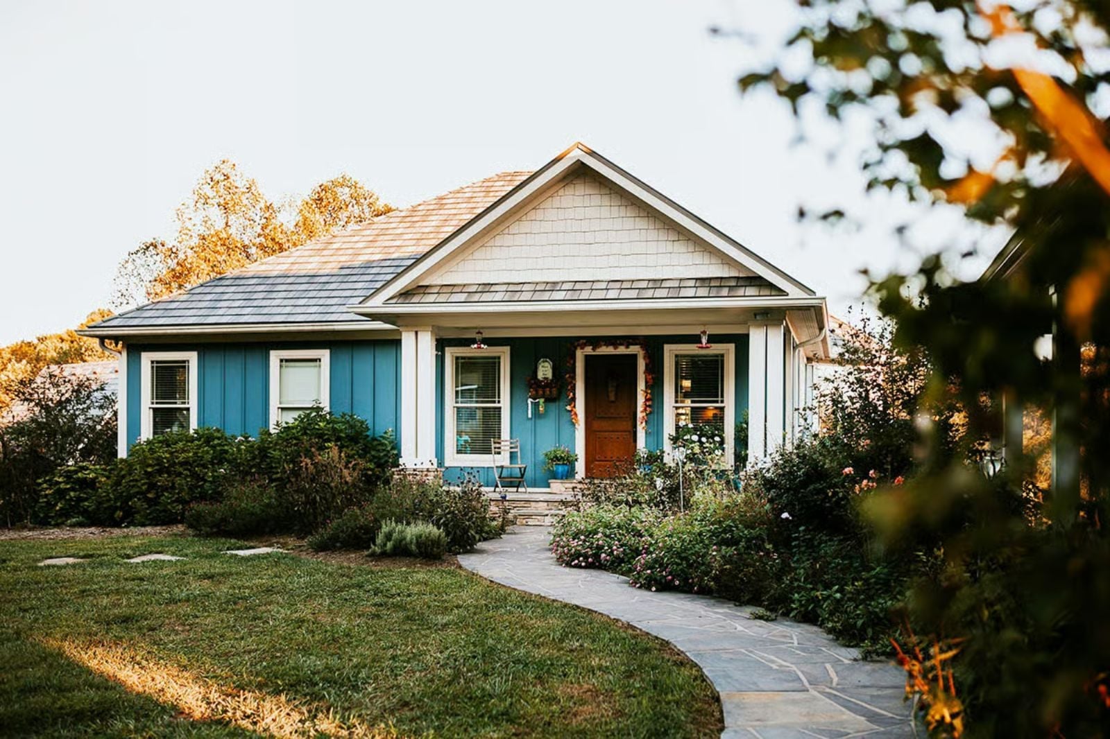 Introducing The Blue Wren 2-Bedroom Bungalow House Plan with Wraparound Deck (1,276 Sq. Ft. Floor Plan)