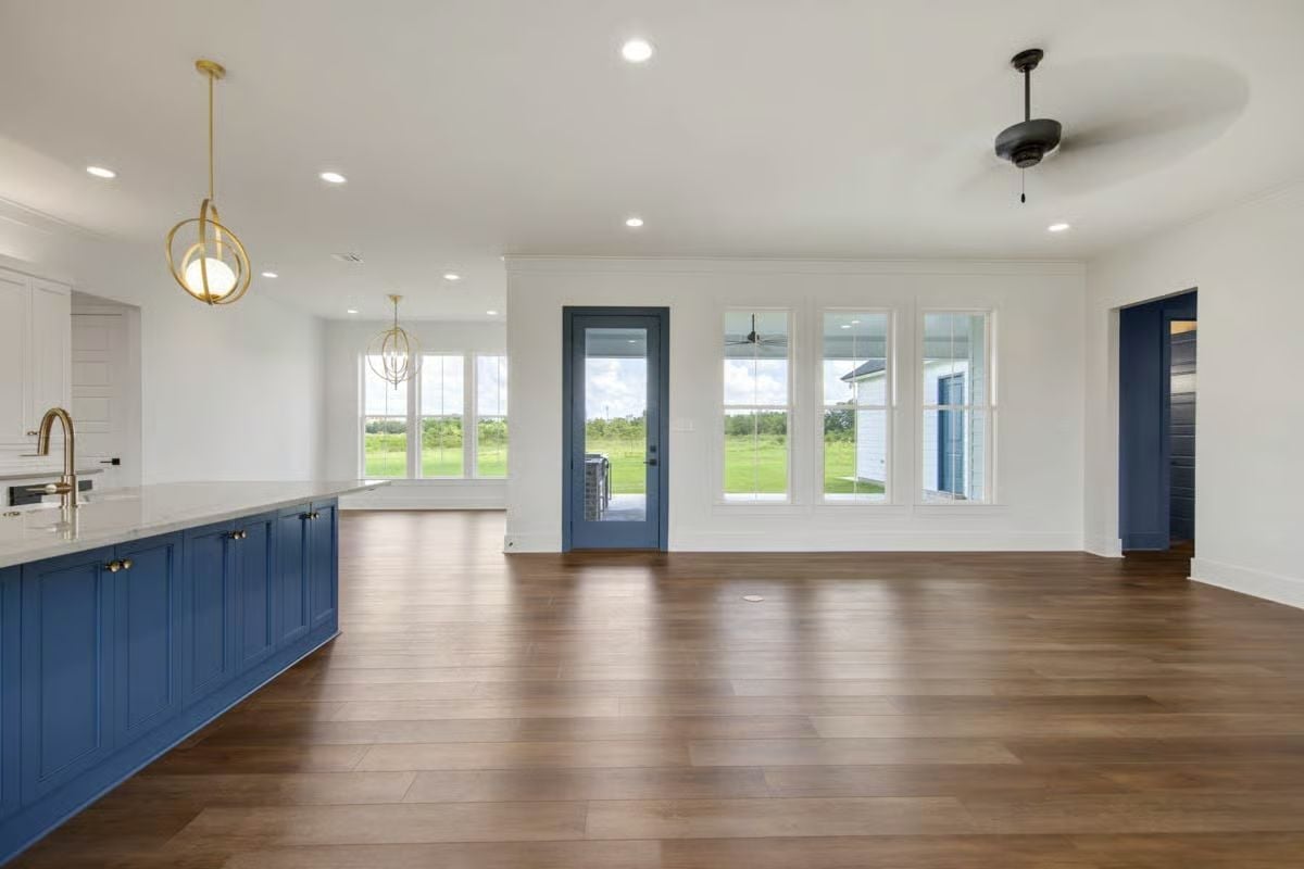 Navy Blue Island Anchors an Open Living Space Built for Real Life