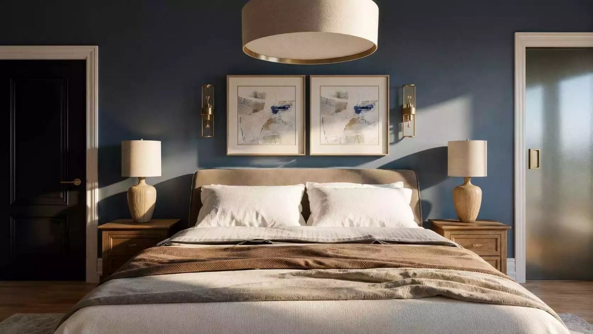 Slate Blue Walls and Warm Brass Do the Heavy Lifting in This Bedroom
