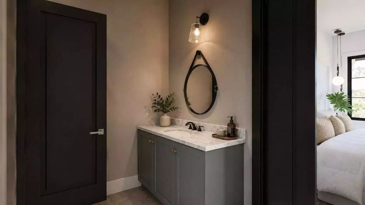 Leather-Strap Mirror and a Sconce That Actually Lights the Right Spot