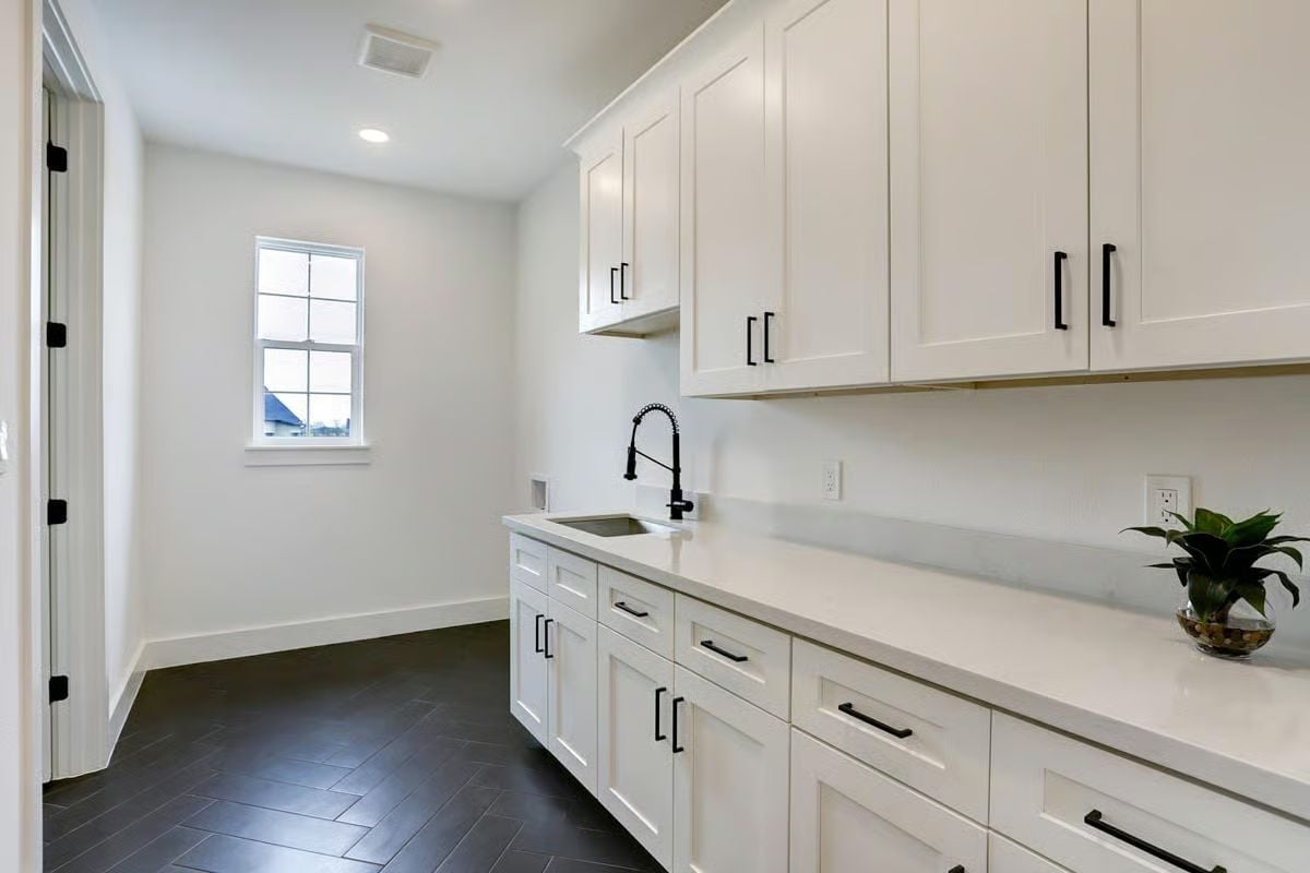 Matte Black Hardware, White Quartz, and a Laundry Room That Actually Works