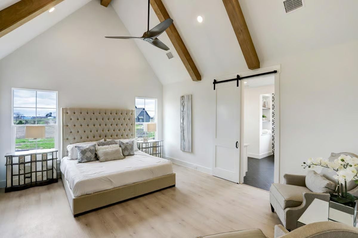 Vaulted Beams, Barn Door, and a Bedroom That Earns Its Square Footage