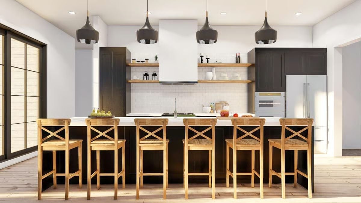 Dark Cabinets and Six Bar Stools Signal a Kitchen Built for Actual Gatherings