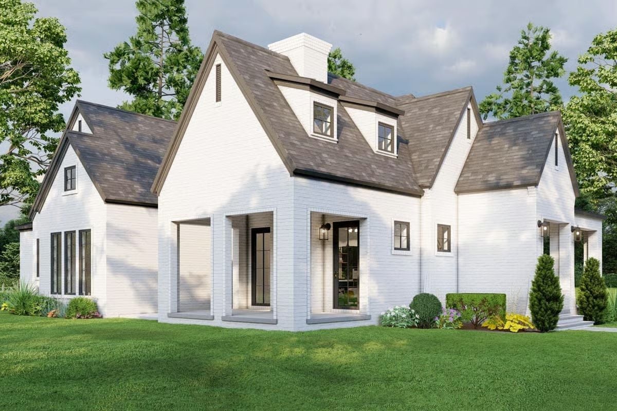 Painted Brick and Steep Gables Give This Modern Farmhouse Its Backbone