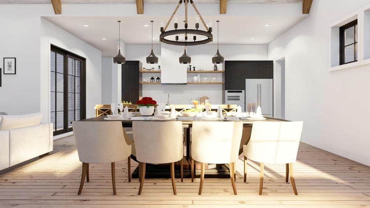 Rope Chandelier and Cream Chairs Pull Double Duty in This Dining Room