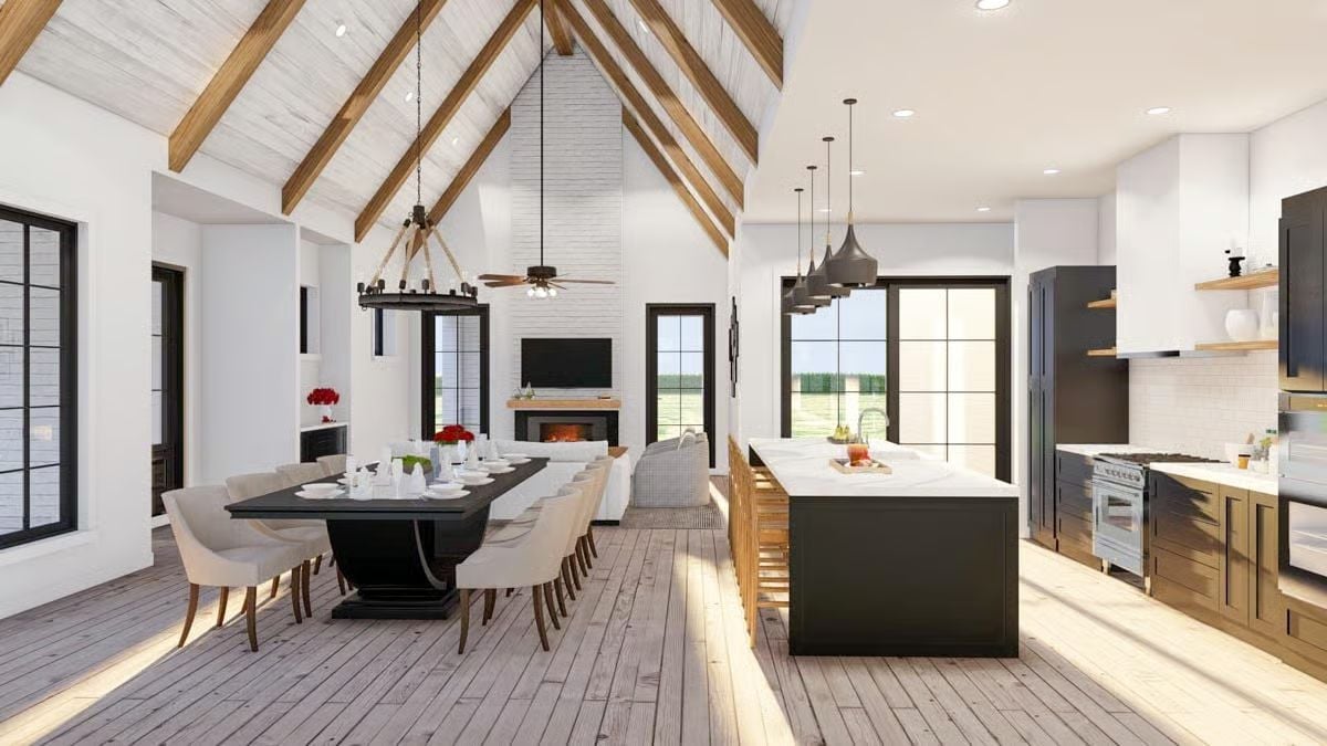 Vaulted Rafters and a Black Island Earn Their Keep in This Open Living Space