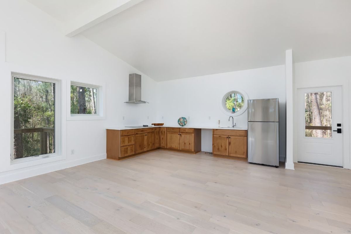 Knotty Wood Cabinets Against White Walls That Actually Work