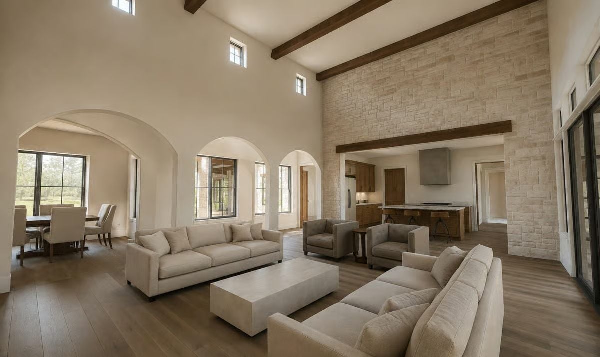 Exposed Beams and Limestone Walls That Make the Room Feel Ancient and New