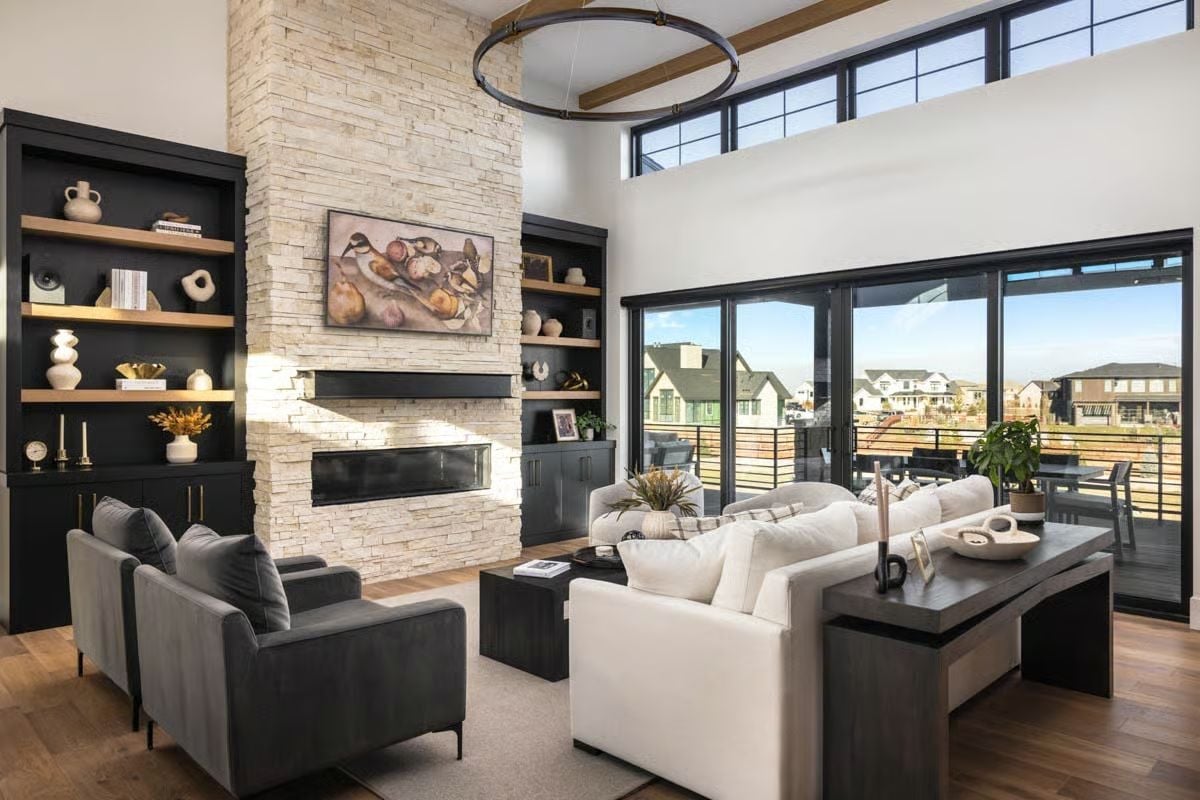 Floor-to-Ceiling Stone Fireplace Earns Every Inch of This Double-Height Great Room