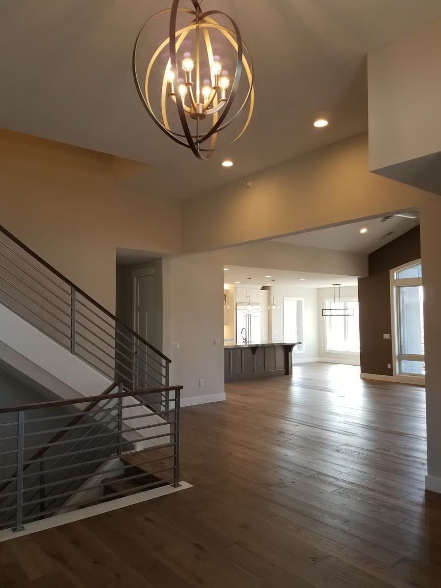 Orb Chandelier Over an Open Entry That Actually Delivers on the Promise