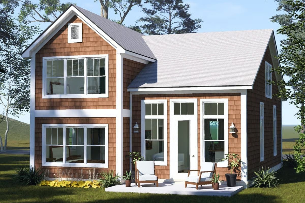 Cedar Shake Siding and French Doors Make This Cottage Punch Above Its Square Footage