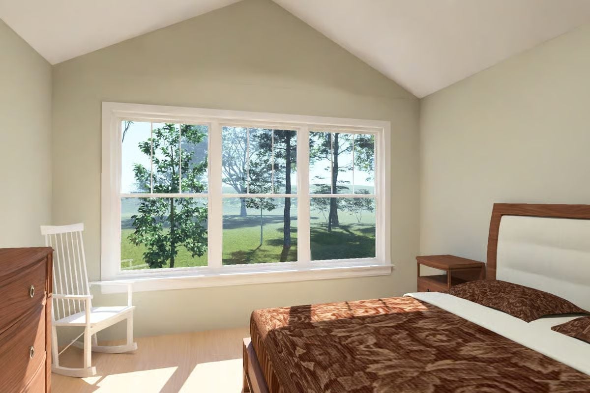 Vaulted Ceiling, Rocking Chair, and a View That Does All the Work