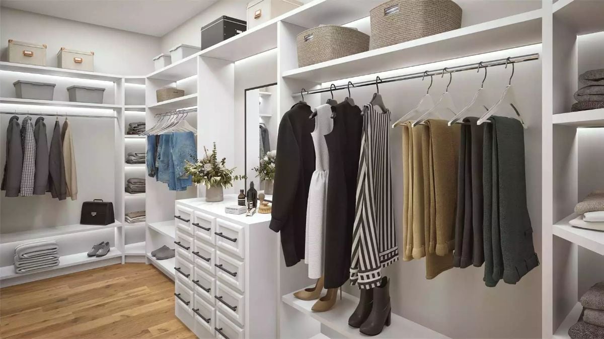 Walk-In Closet with Island Drawers and a Hanging Section That Actually Has Room to Breathe