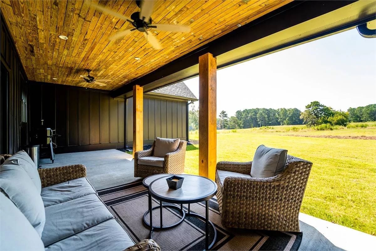 Covered Porch, Open Field, and Ceiling Fans Doing Actual Work Out Here
