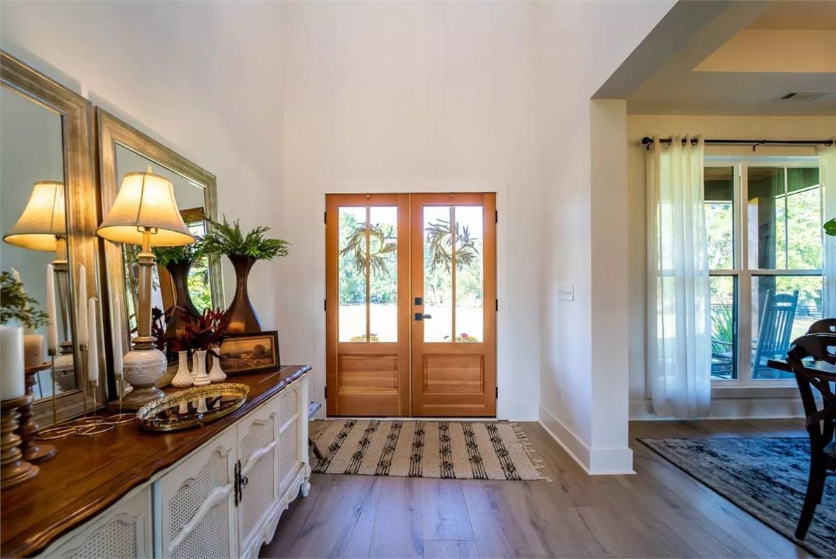 French Doors, Warm Wood, and a Console That's Clearly Been Somewhere