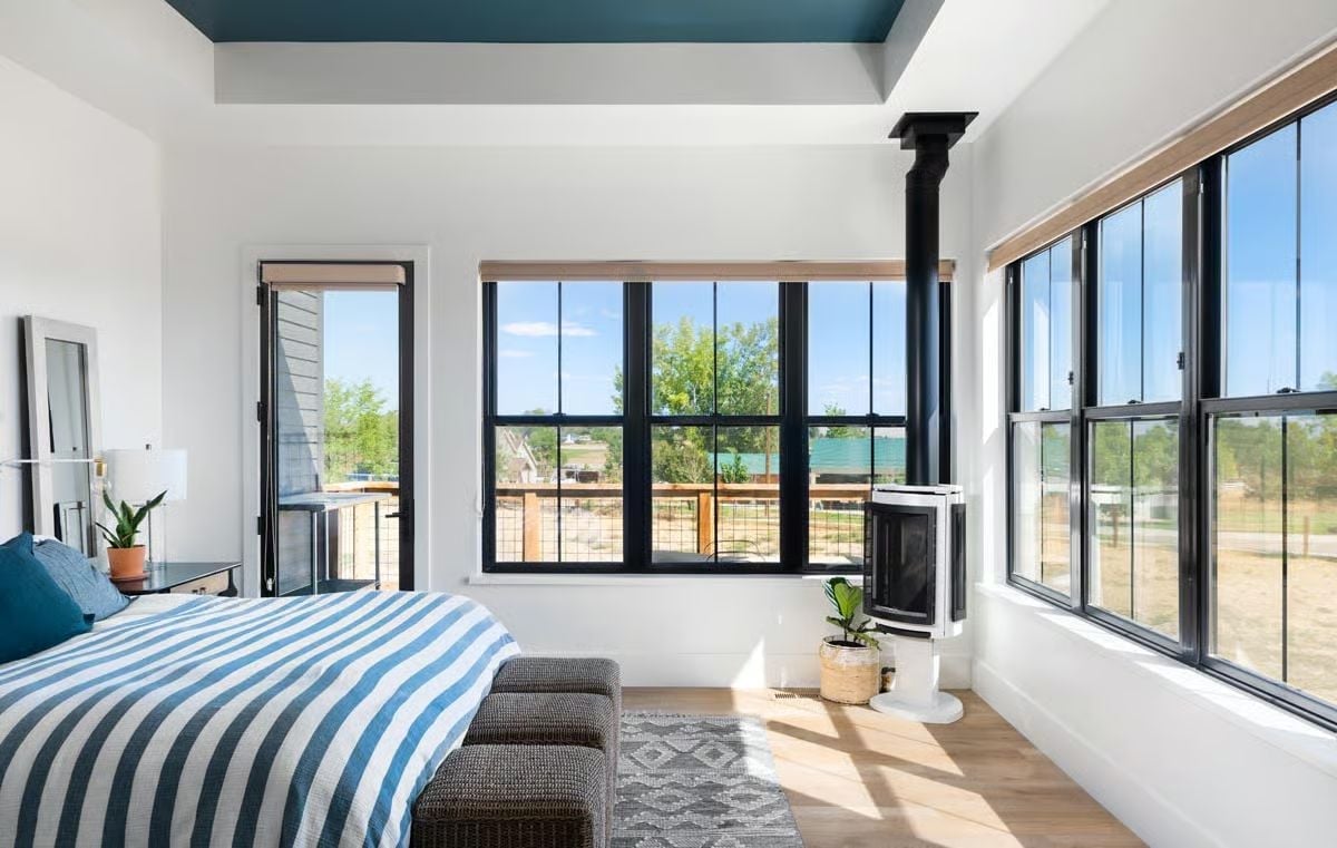 Black Frames, Blue Stripes, and a Wood Stove That Actually Earns Its Place