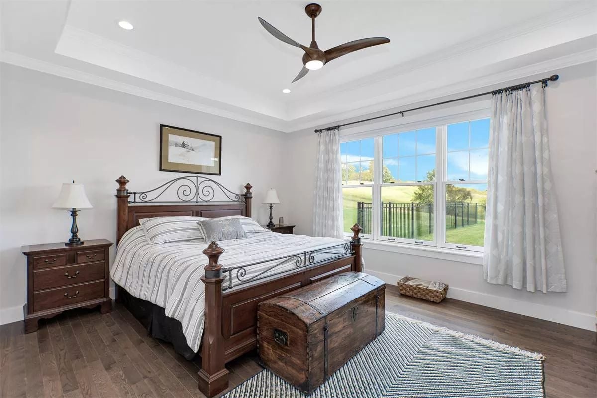 Wrought Iron Bed Frame and a Vintage Trunk Pull This Room Back in Time