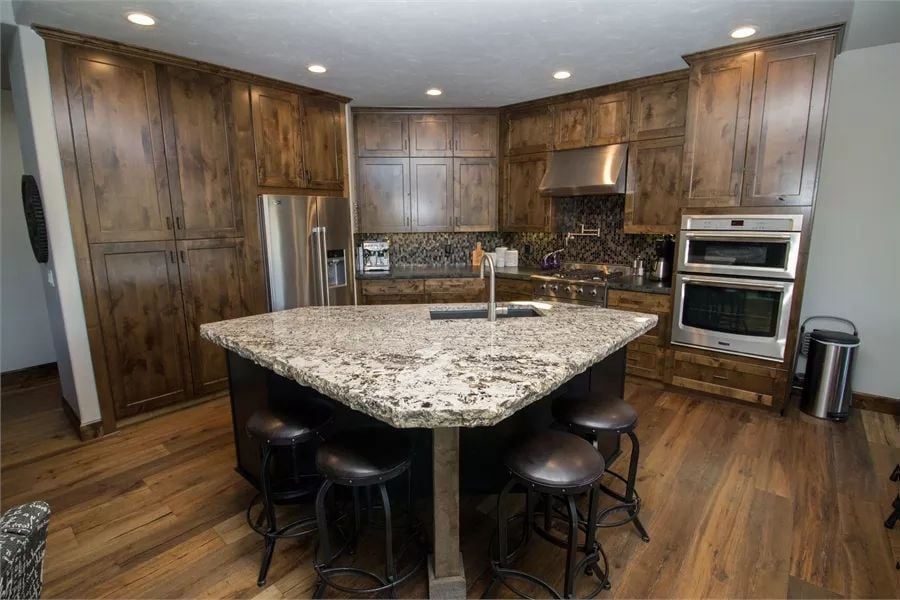 Dark Walnut Cabinets and a Live-Edge Island That Mean Business