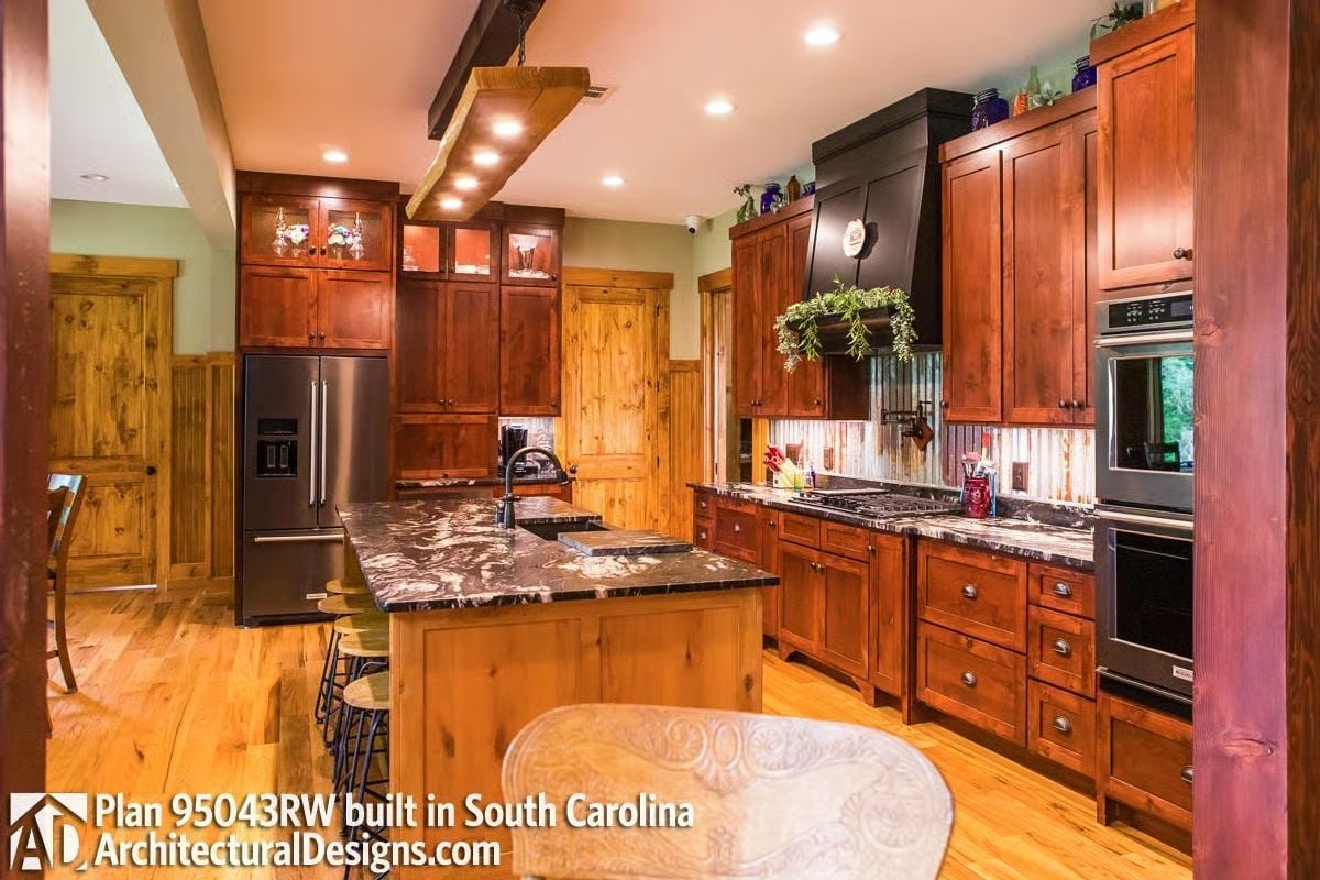 Warm Wood Cabinetry and Dark Granite Make This Kitchen Worth the Drive to South Carolina