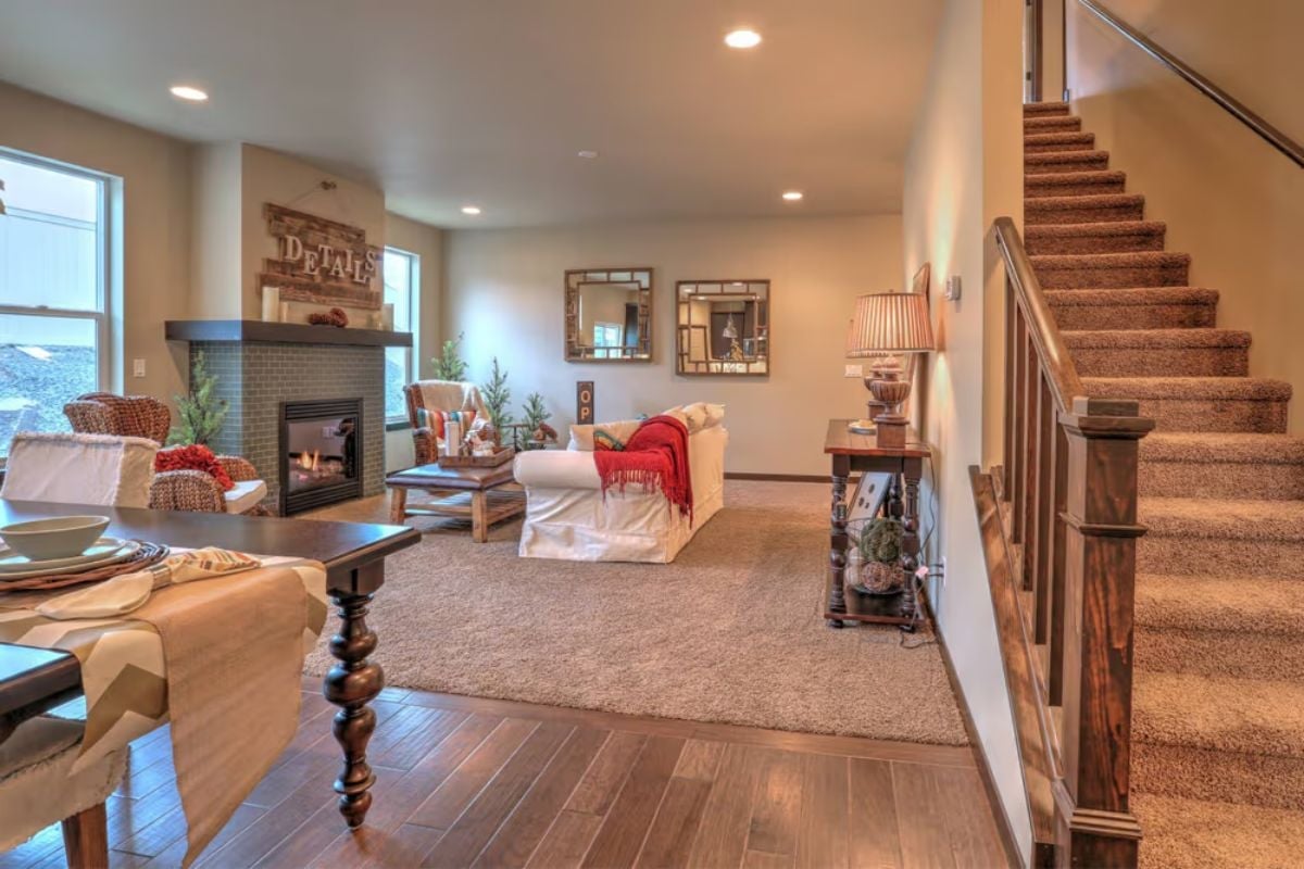 Hardwood Stops, Carpet Starts, and the Living Room Knows Exactly What It Is