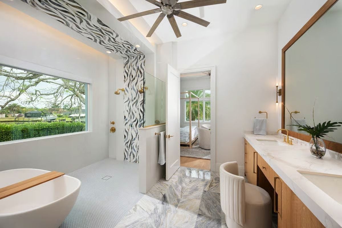 Penny Tile, Black-and-White Mosaic, and Brass Fixtures That Pull It Together