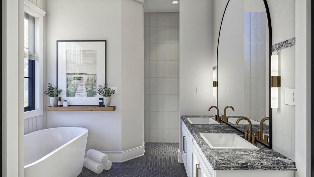 Freestanding Tub Bathroom Where Brass Fixtures Pull the Whole Room Together