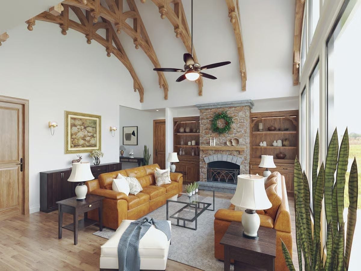 Carved Timber Trusses and Cognac Leather Where the Fireplace Does the Work