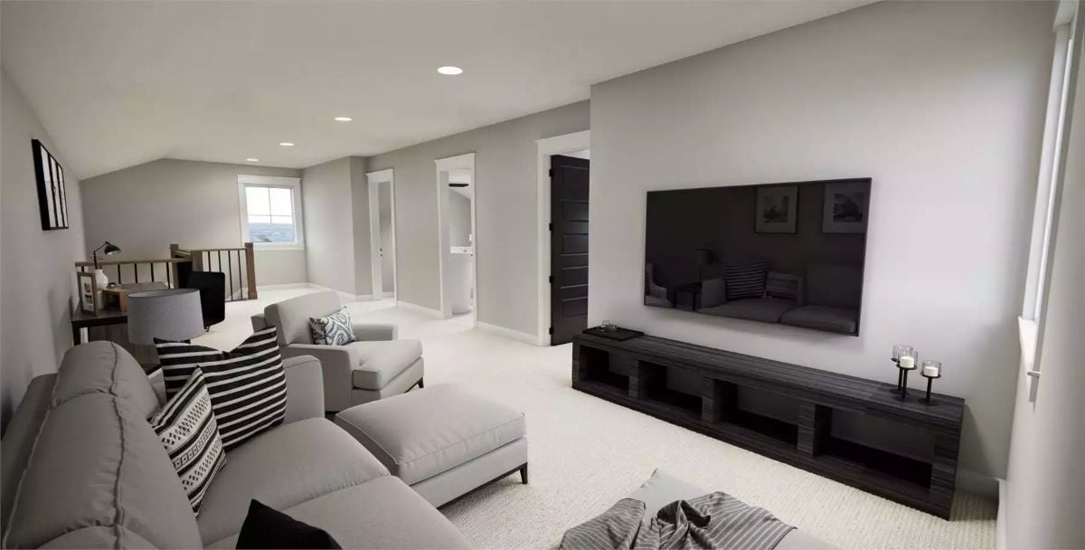 Upstairs Bonus Room With a TV Wall That Skips the Gallery Frame Clutter