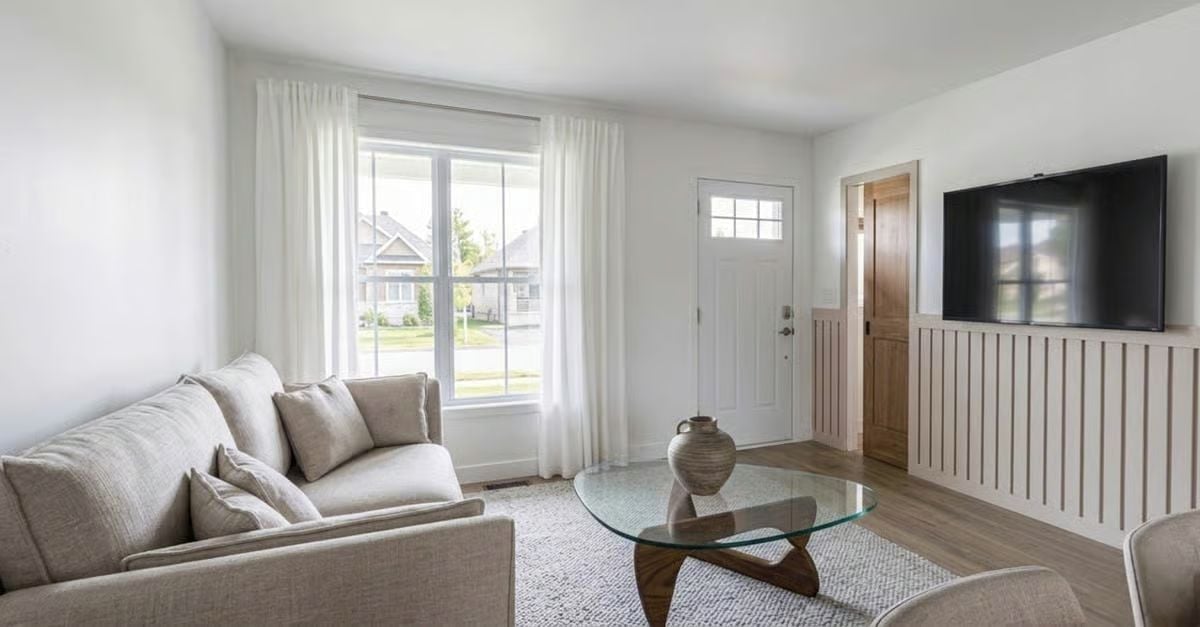 Shiplap Wainscoting and a Noguchi Table Walk Into a Living Room