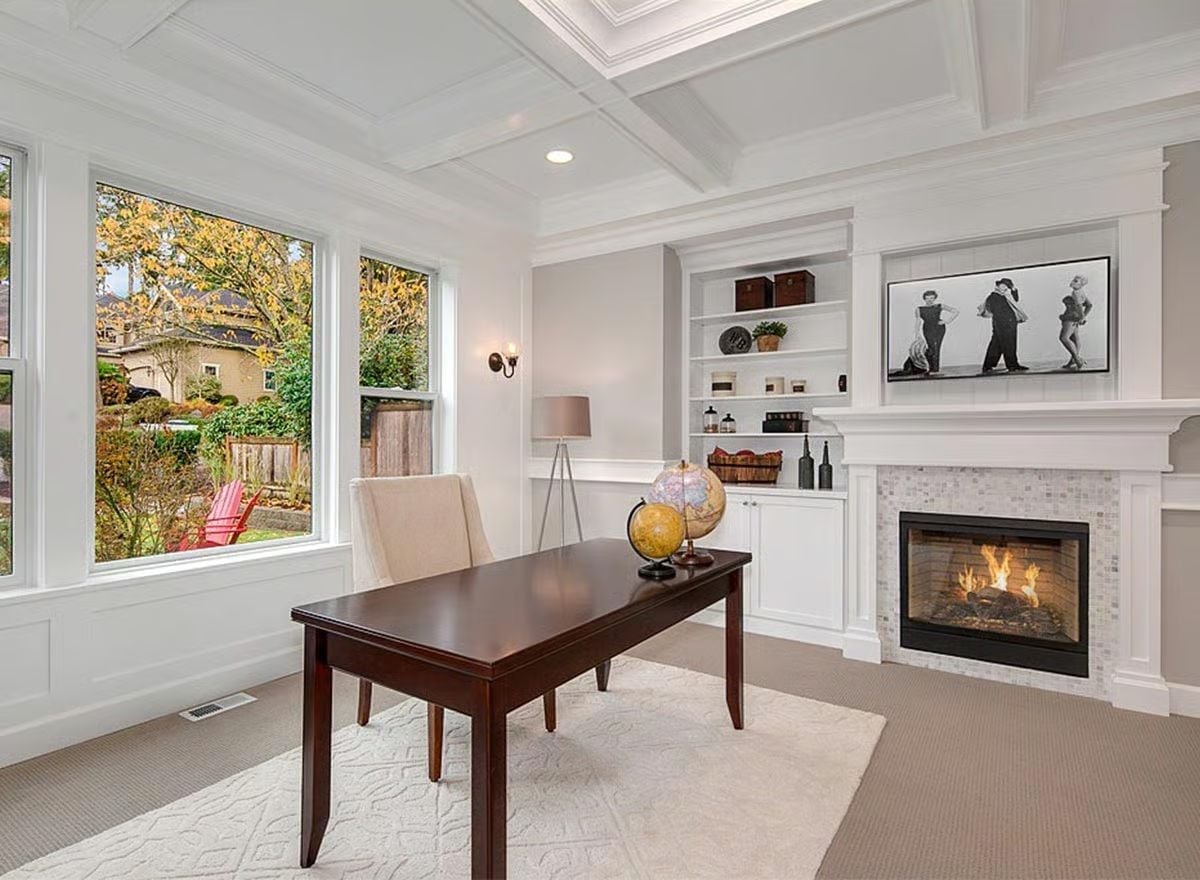 Coffered Ceiling and Fireplace Make This Home Office Feel Like It Means Business