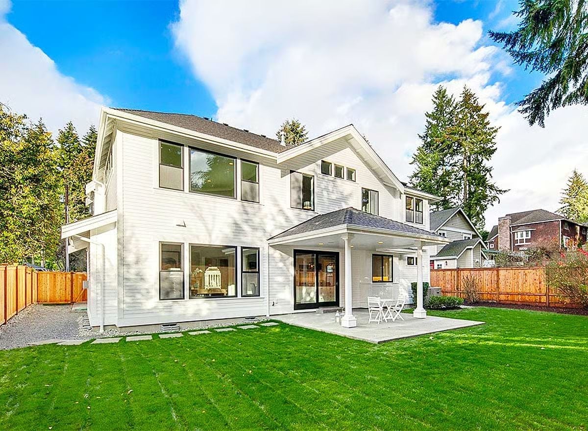 Crisp White Siding and a Covered Patio Built for Pacific Northwest Summers