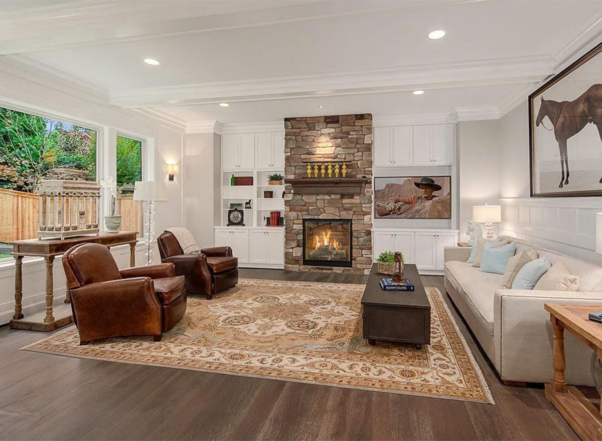 Stone Fireplace and Leather Chairs Pull Off Western Warmth Without Trying Too Hard