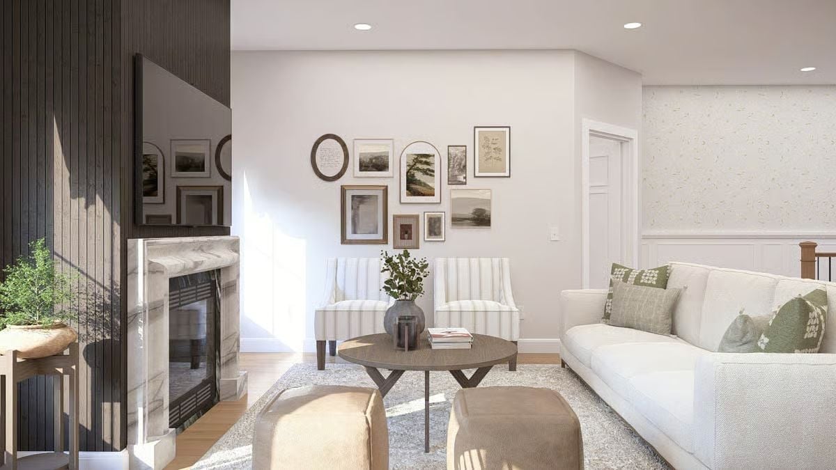 Marble Fireplace and Gallery Wall Set the Tone for This Sitting Room