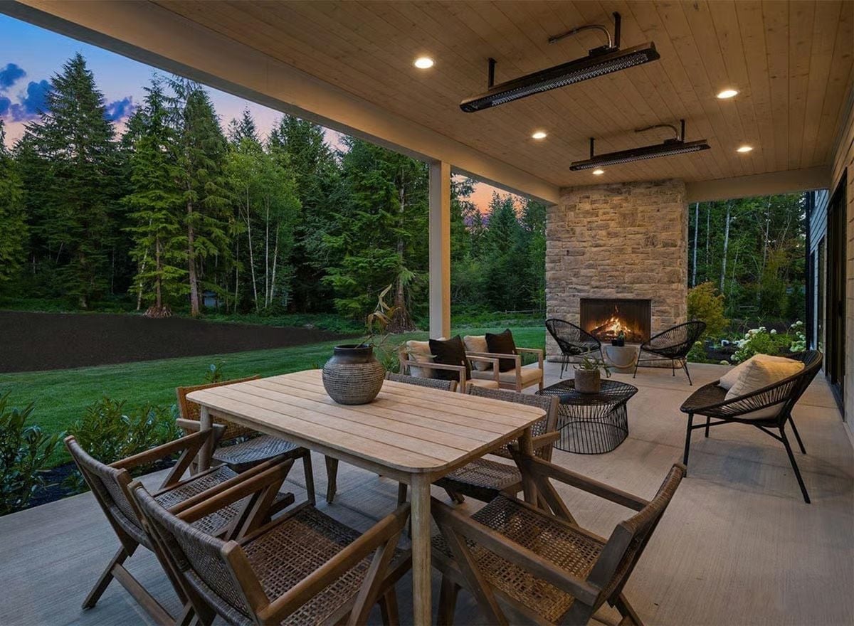 Covered Patio Built Around a Stone Fireplace That Actually Gets Used