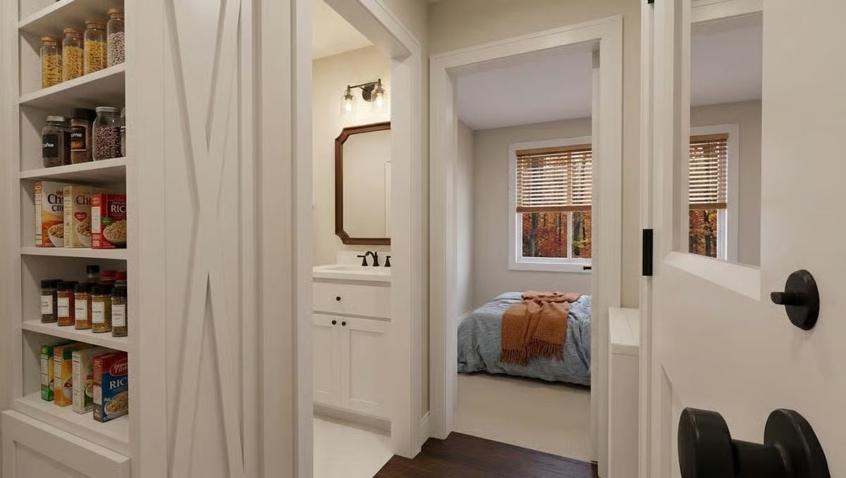 Pantry Door Opens to a Hallway Connecting Bath and Bedroom