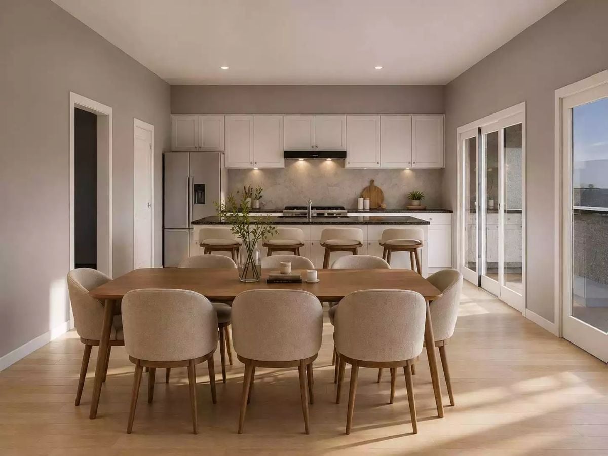 Boucle Chairs and Warm Wood Pull a Big Table Back from Feeling Formal