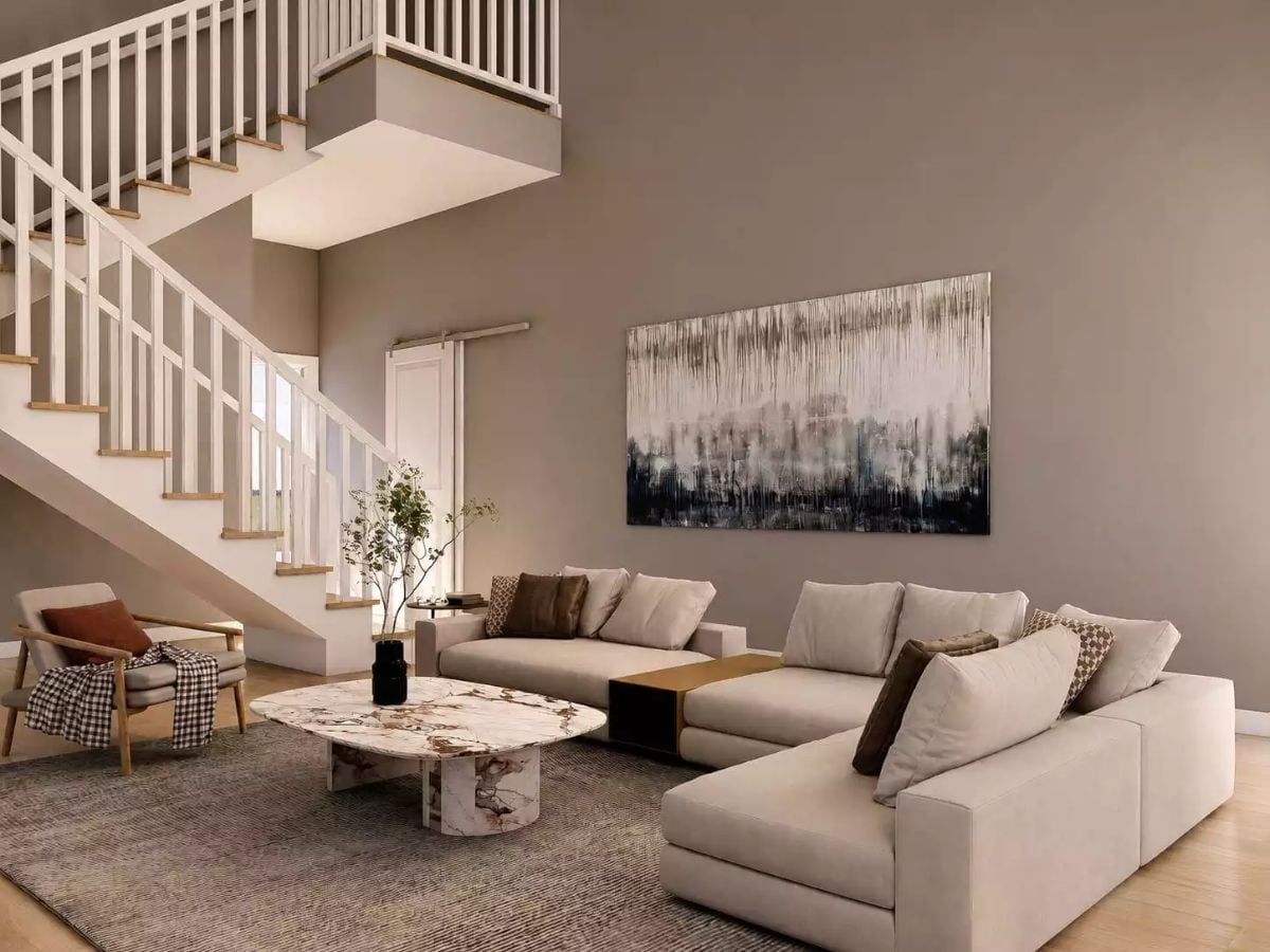 Marble Coffee Table Earns Its Keep in This Double-Height Living Room