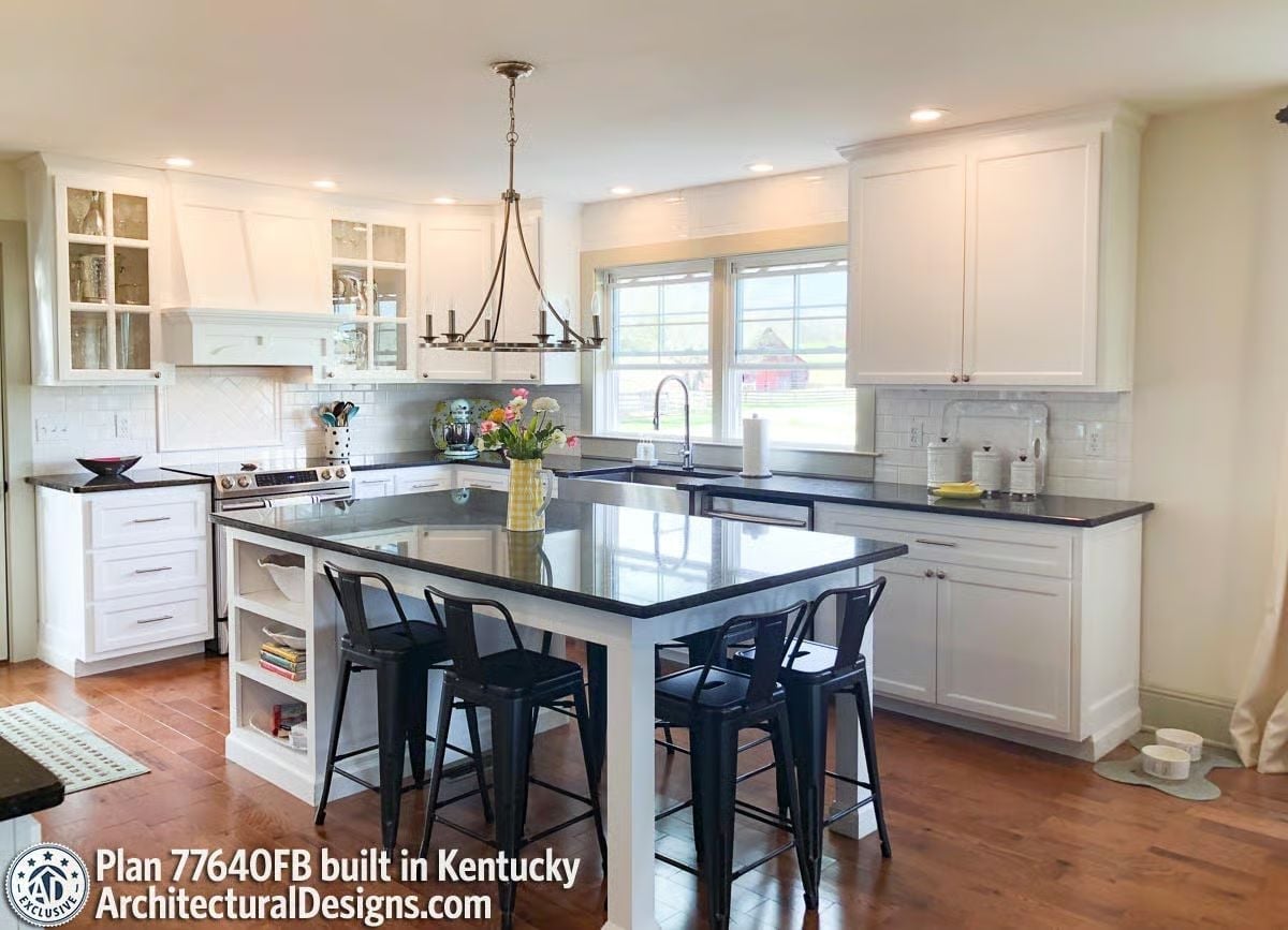 Dark Granite Island with Seating Turns Kitchen Work into Something Worth Lingering Over