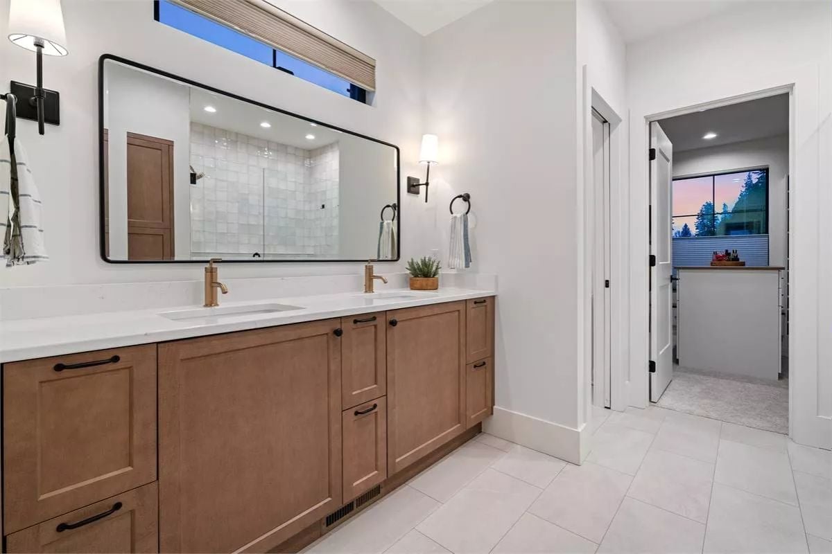 Brass Faucets and a Black-Frame Mirror That Pull the Whole Vanity Together
