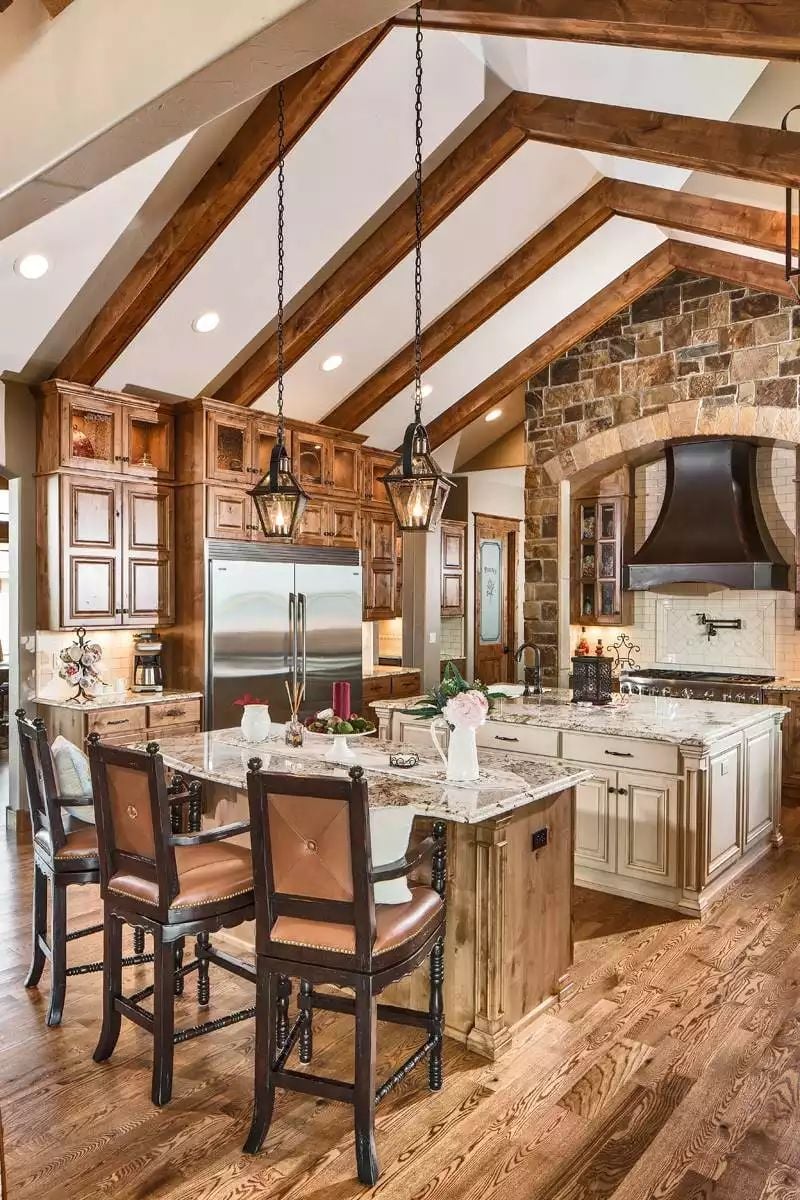 Leather Barstools and Lantern Pendants Set the Tone in This Rustic Kitchen