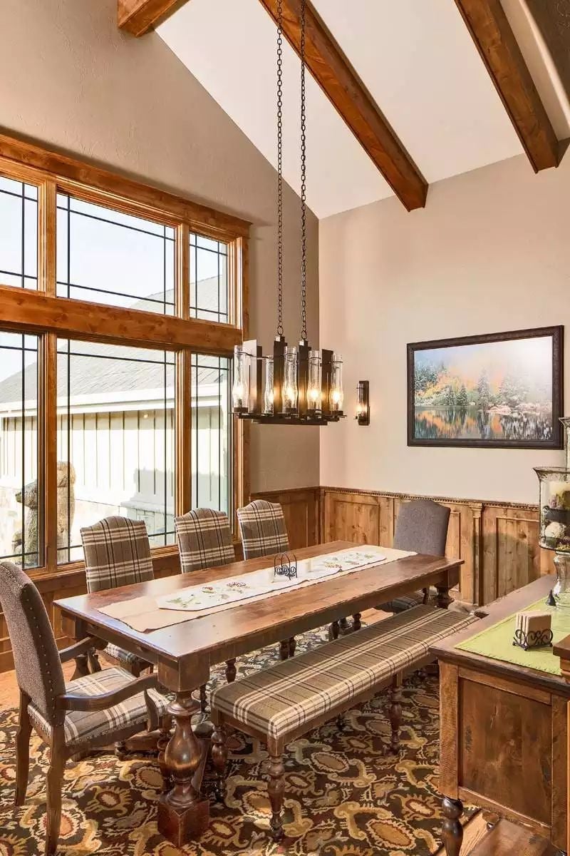 Plaid Benches and Exposed Beams Make This Dining Room Feel Like a Mountain Retreat