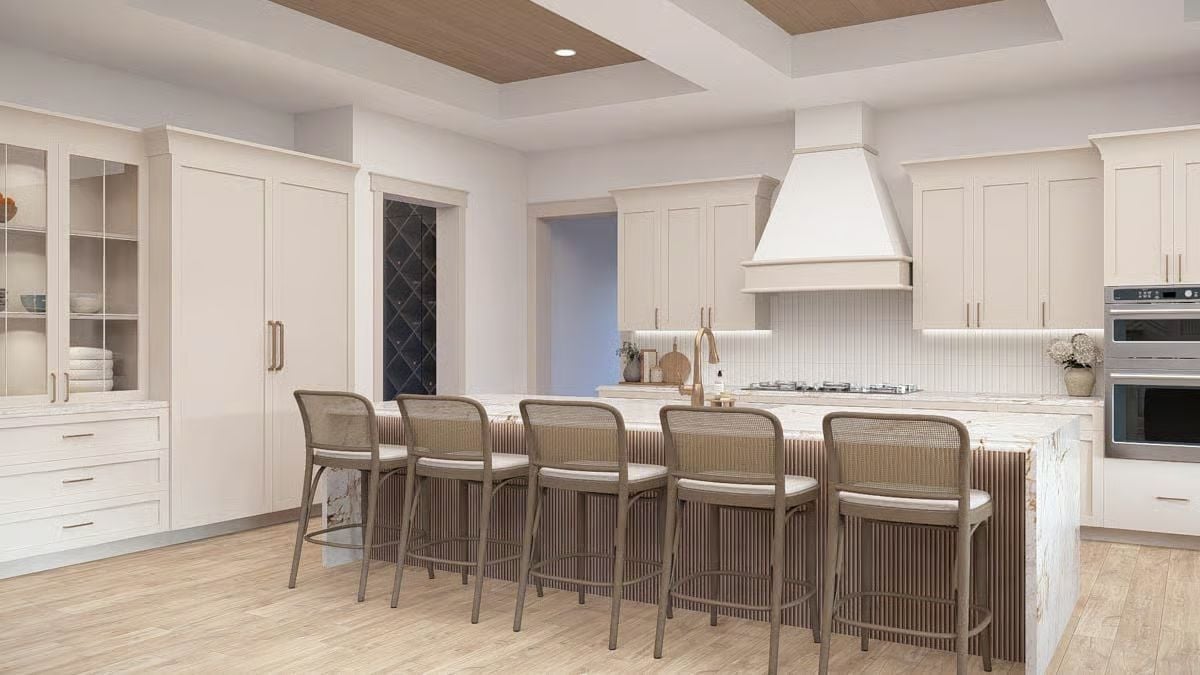 Fluted Island Skirt and Rattan Barstools That Earn Their Keep in a White Kitchen