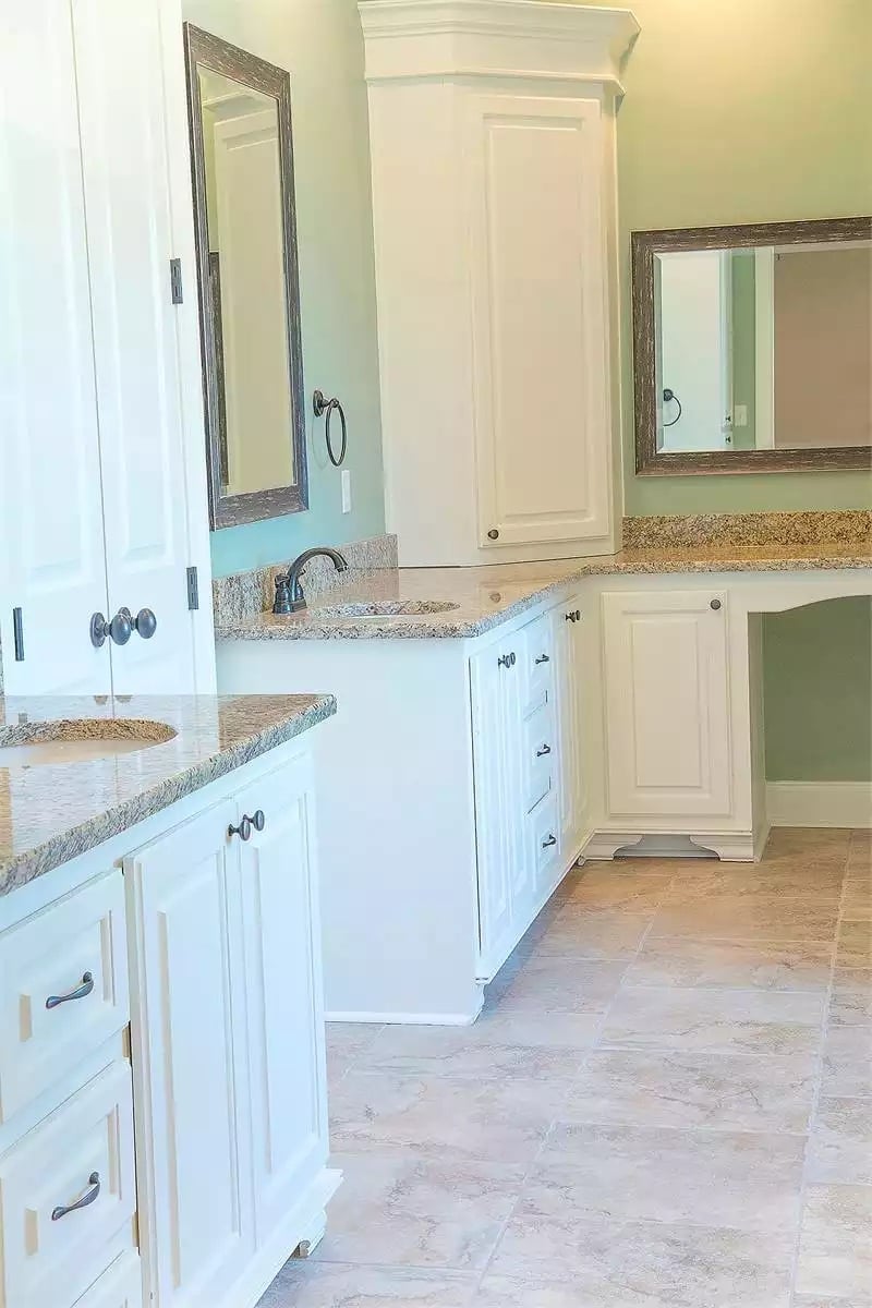 Double Vanities, a Corner Tower Cabinet, and a Sit-Down Makeup Area That Actually Has Room to Breathe