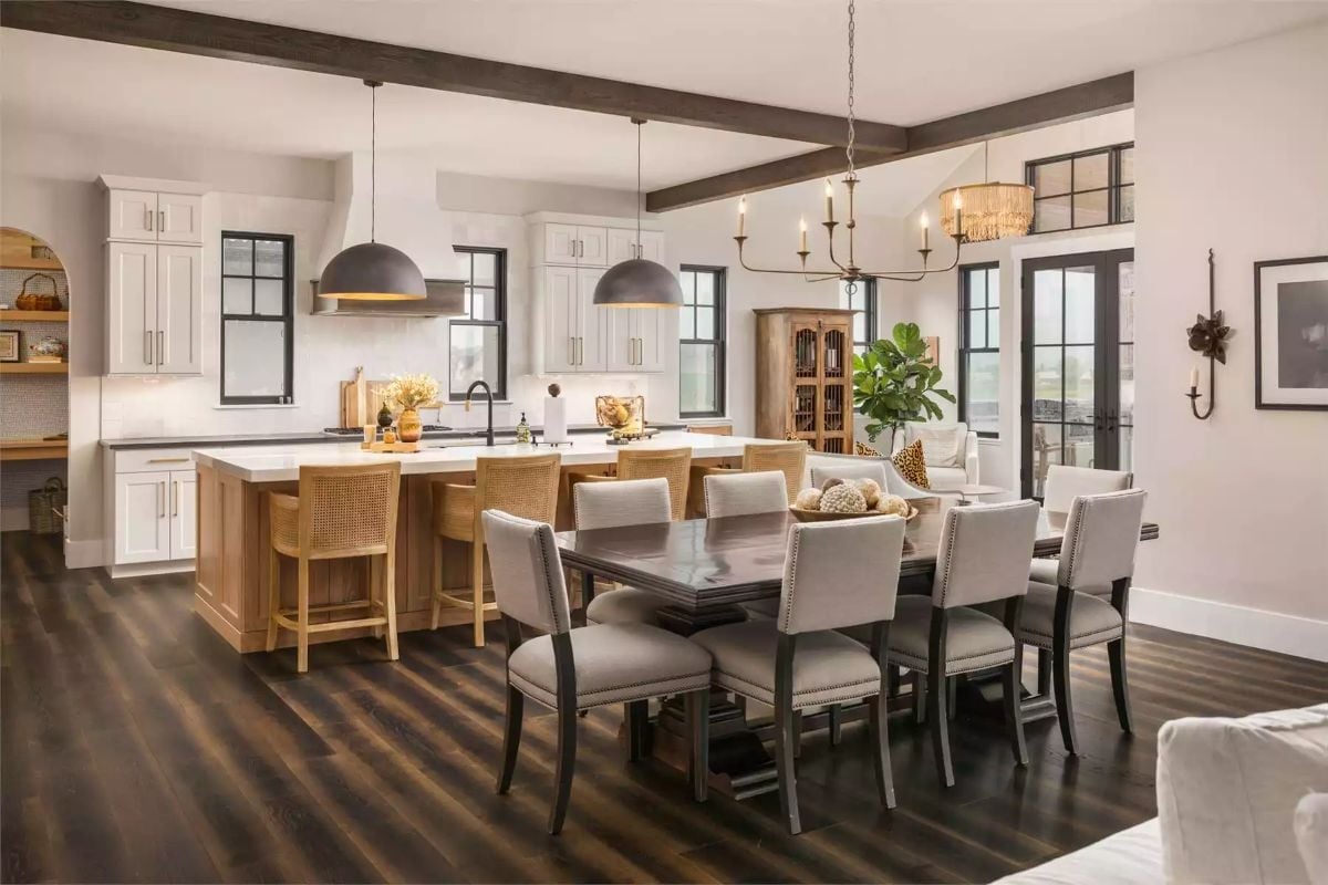 Cane Barstools, Dark Ceiling Beams, and a Dining Table That Seats the Whole Extended Family