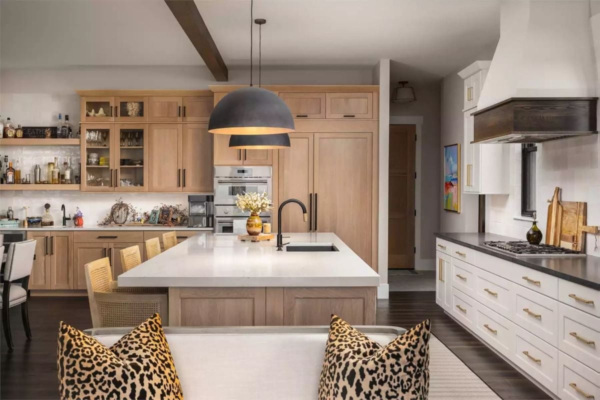 Leopard Pillows and Light Oak in a Kitchen That Refuses to Play It Safe