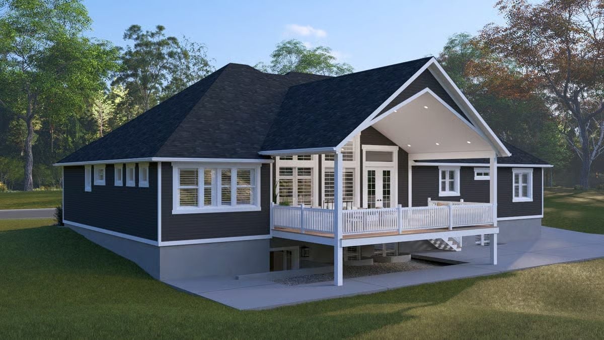 Dark Siding, White Rails, and a Covered Porch That Actually Earns Its Square Footage